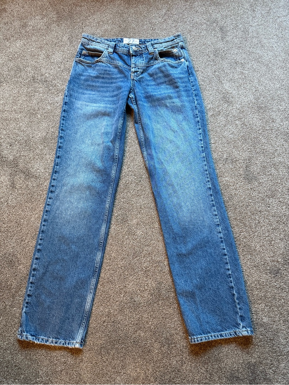 We The Free light blue denim jeans with tag detail